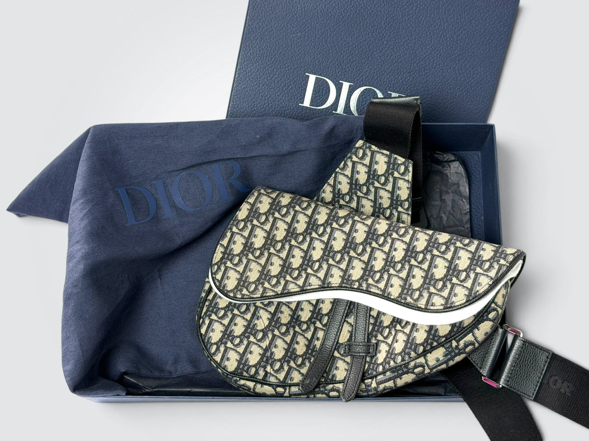 Pre-Owned Christian Dior Men’s Saddle Bag – Cream and Black Dior Oblique Jacquard Canvas with Adjustable Black Strap