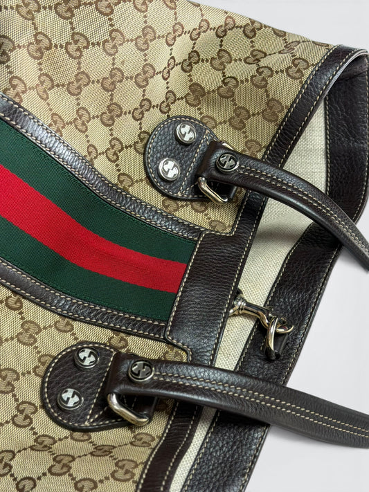 vintage Gucci GG canvas medium Sunset tote featuring dark brown leather trim and the signature green and red Web stripe.