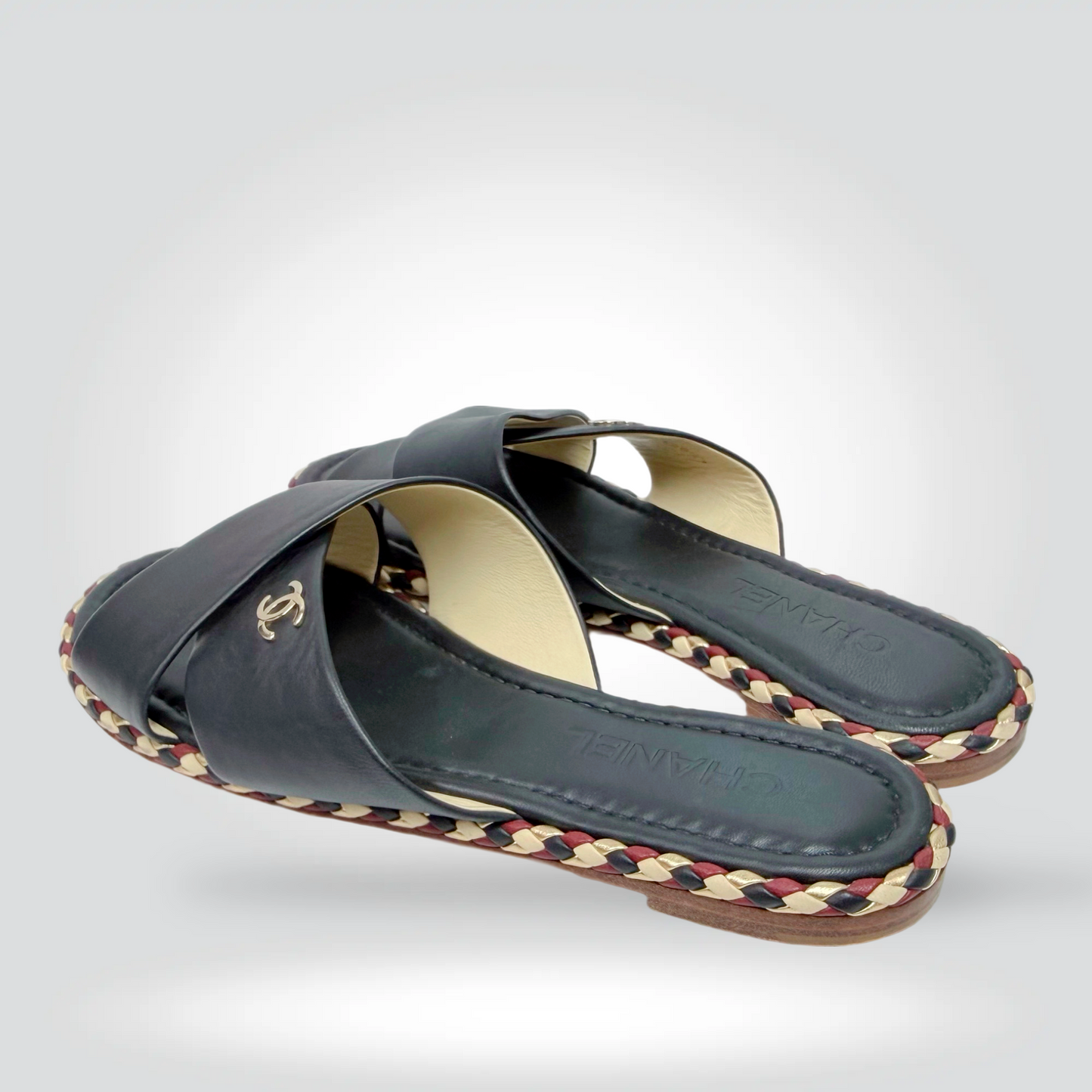Pre-Owned Chanel Crossed Strap Slide Sandals Black  Leather CC Logo Braided Sole Trim — Size — Excellent  Style Reissue Vancouver