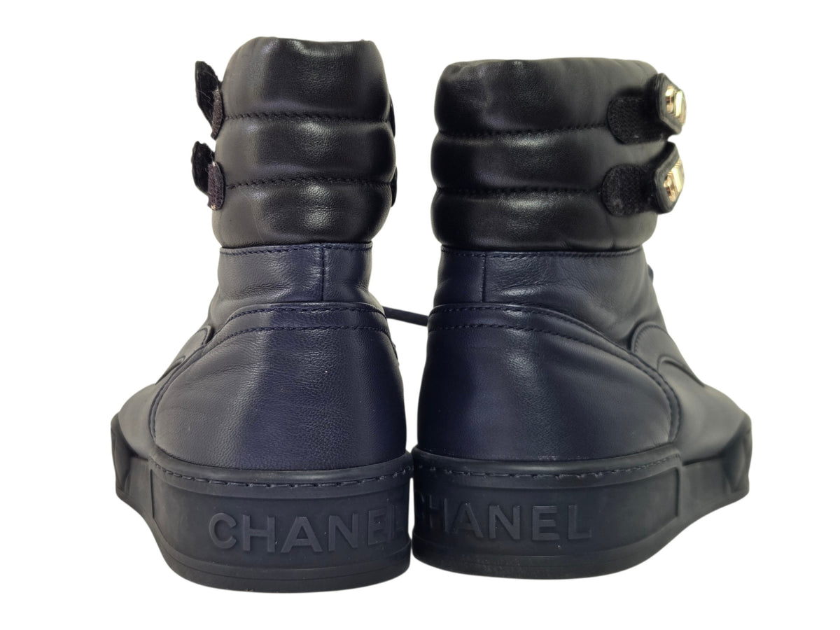 Pre-Owned Chanel Black Leather High-Top Sneakers with Gold Logo — Size 41
