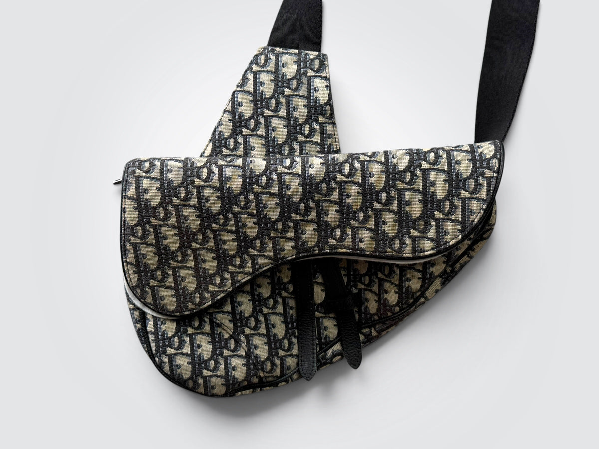 Pre-Owned Christian Dior Men’s Saddle Bag – Cream and Black Dior Oblique Jacquard Canvas with Adjustable Black Strap