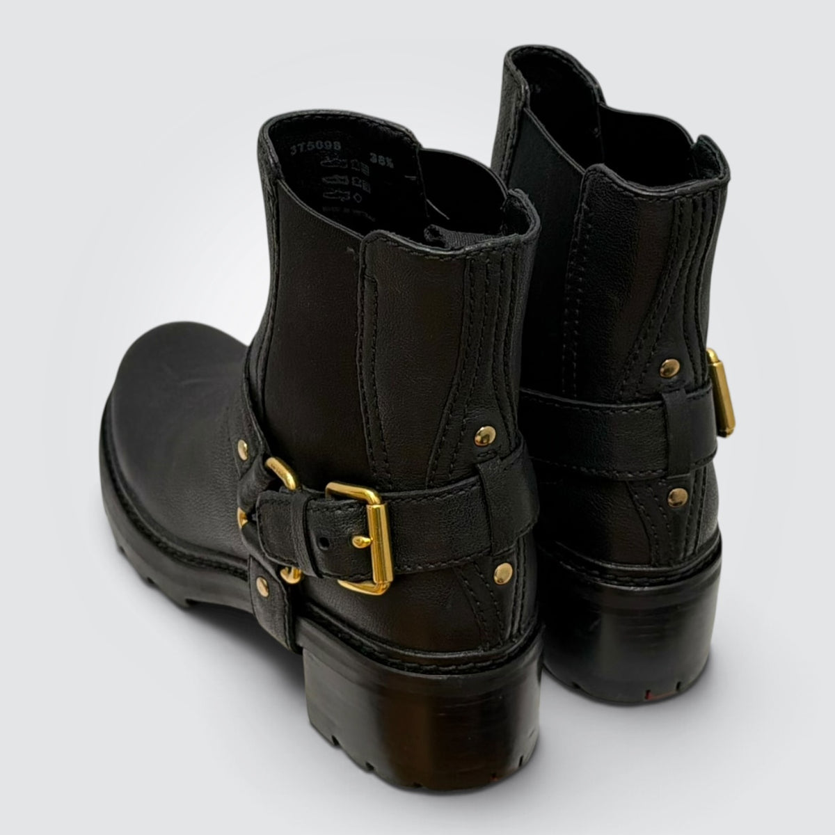 Pre-Owned Prada Black Leather Moto Ankle Boots with Gold-Tone Harness Strap — Size 38.5