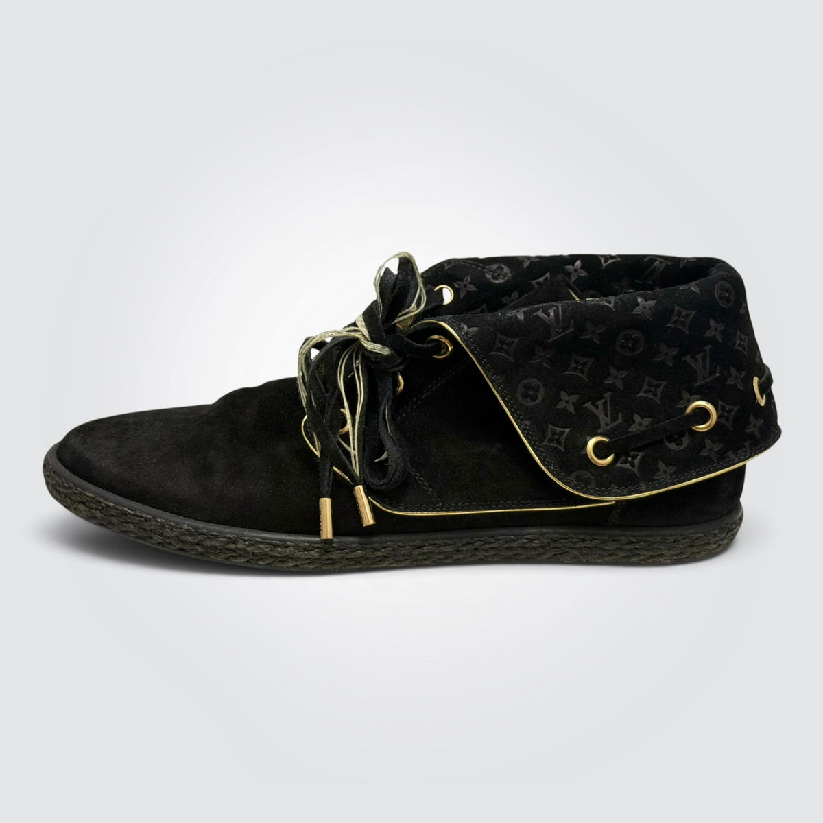 Pre-owned Louis Vuitton black suede ankle boots with tonal monogram pattern and gold-tone hardware, size 41 — available at Style Reissue Vancouver