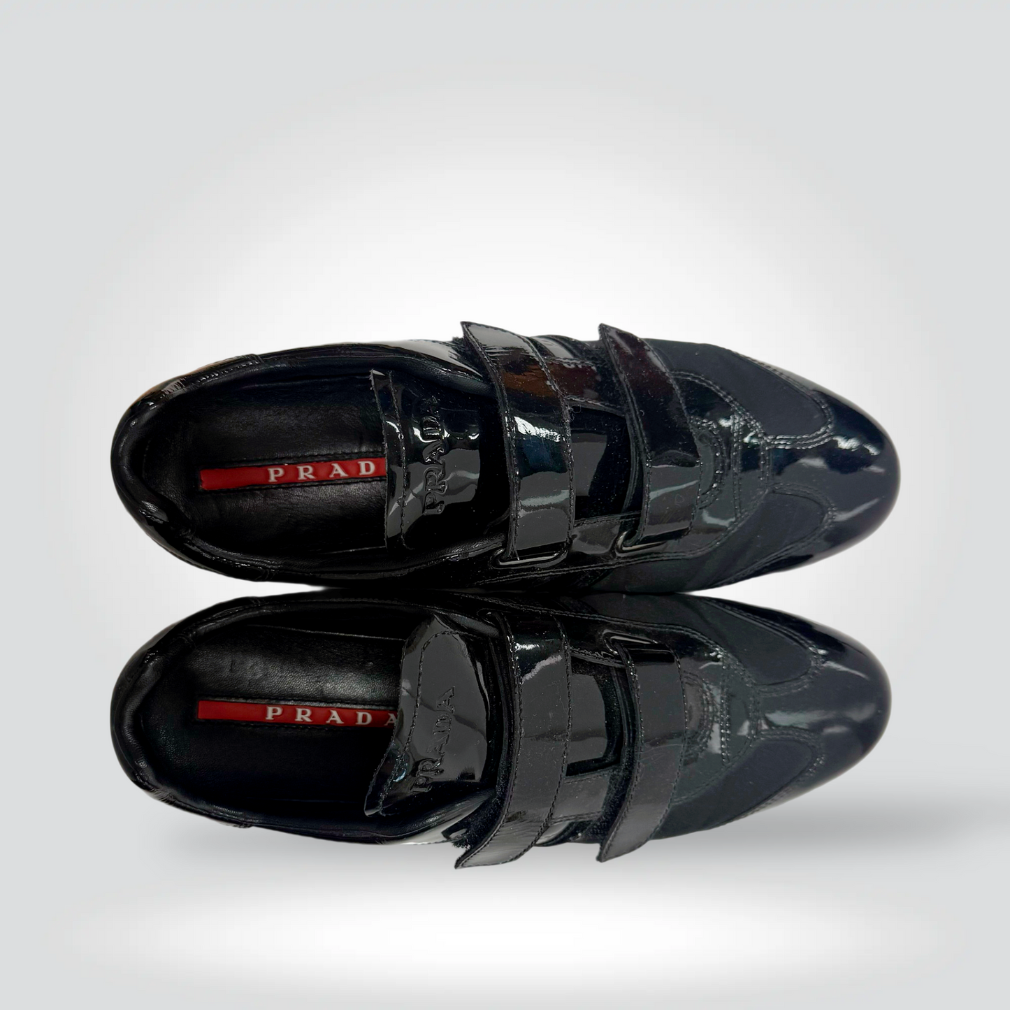 Pre-Owned Prada black patent leather velcro strap sneakers red logo tab — Style Reissue Vancouver
