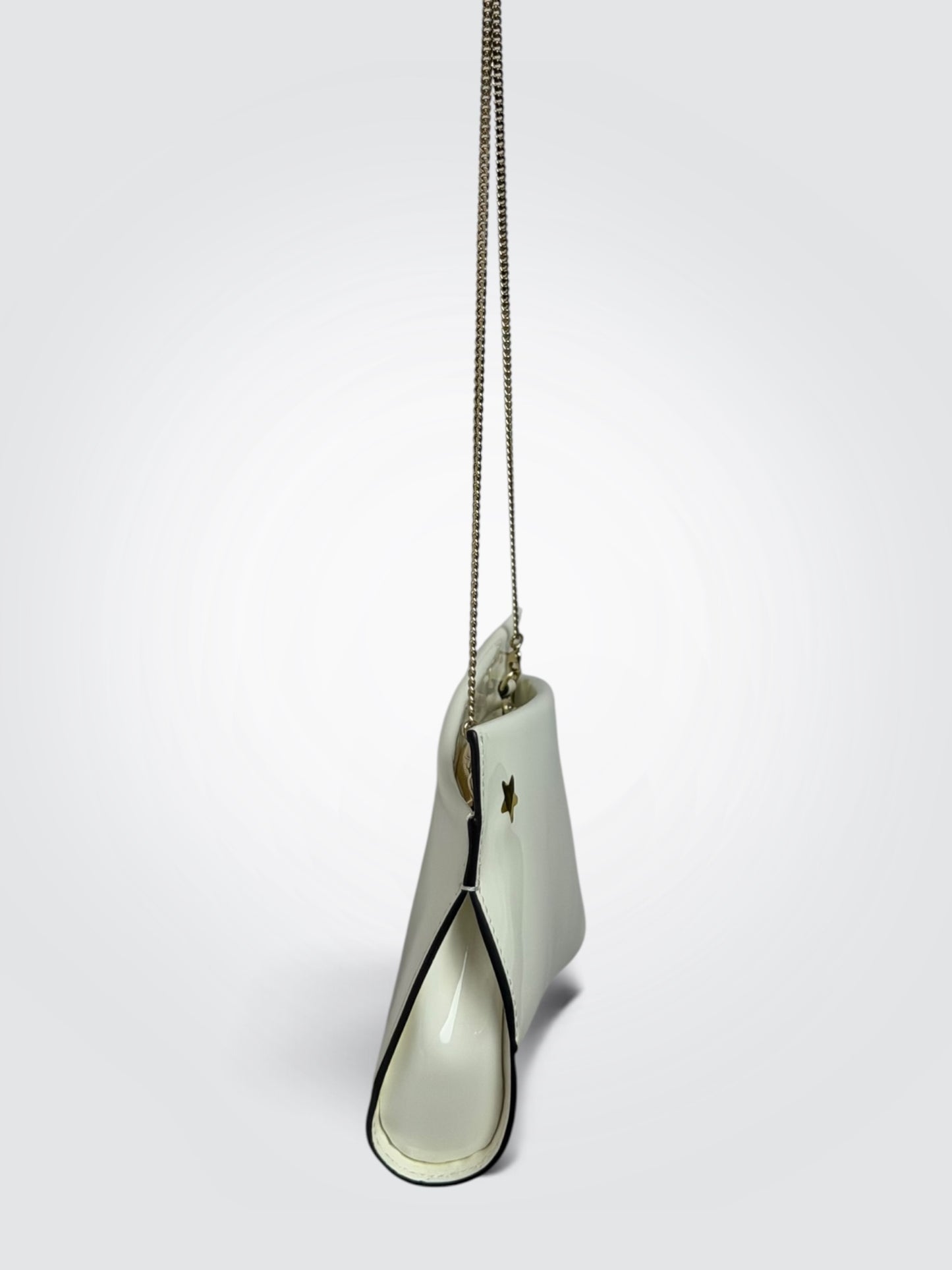 Christian Louboutin white patent leather Loubitwist small clutch with a detachable chain strap and signature star detail.