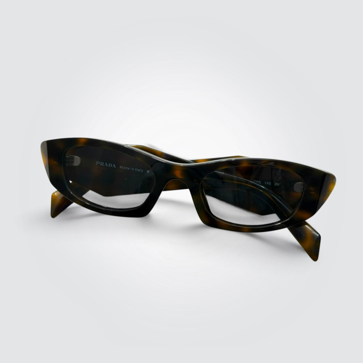 Pre-owned Prada tortoise cat-eye sunglasses with original case