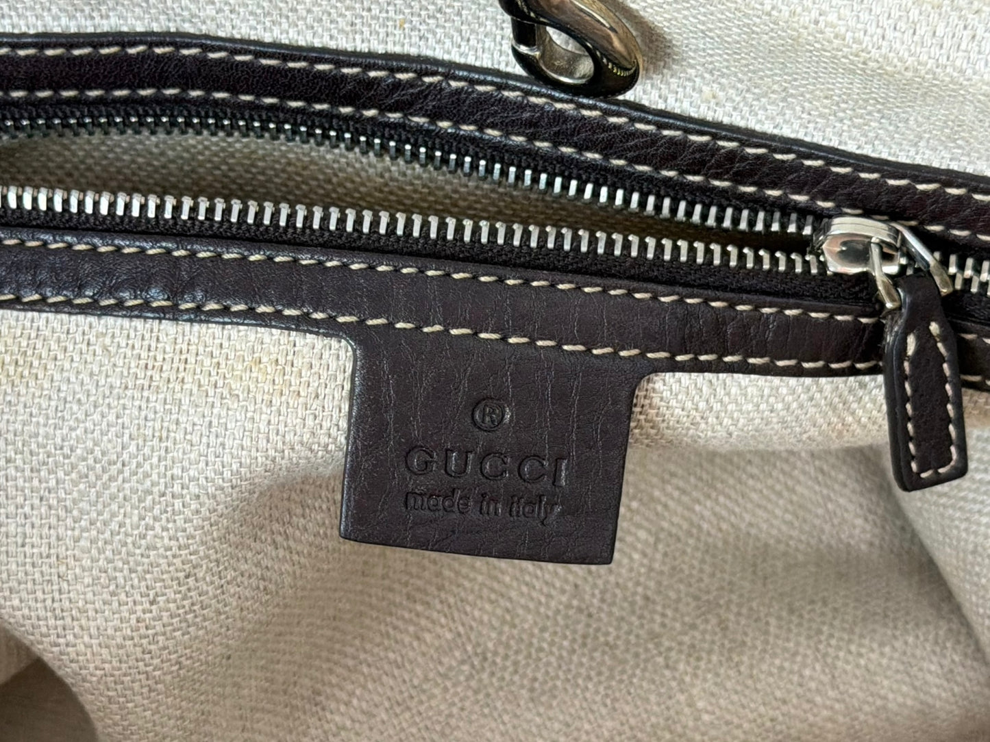 vintage Gucci GG canvas medium Sunset tote featuring dark brown leather trim and the signature green and red Web stripe.