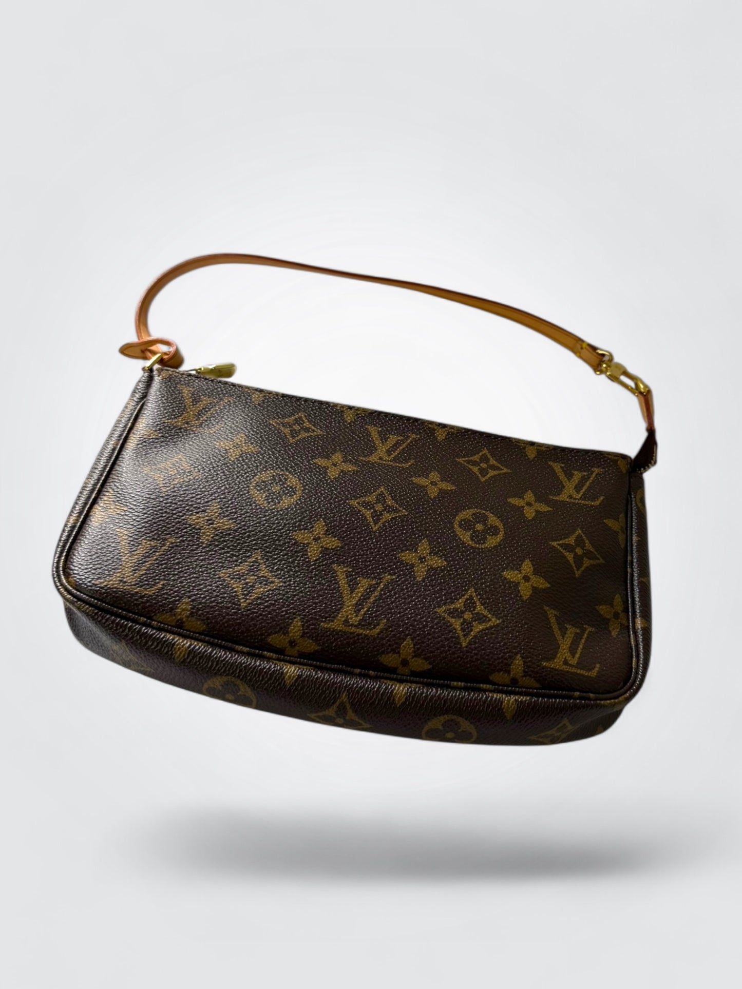 Vintage Louis Vuitton Monogram Pochette Accessoires shoulder bag in brown coated canvas with slim natural leather strap and gold-tone hardware