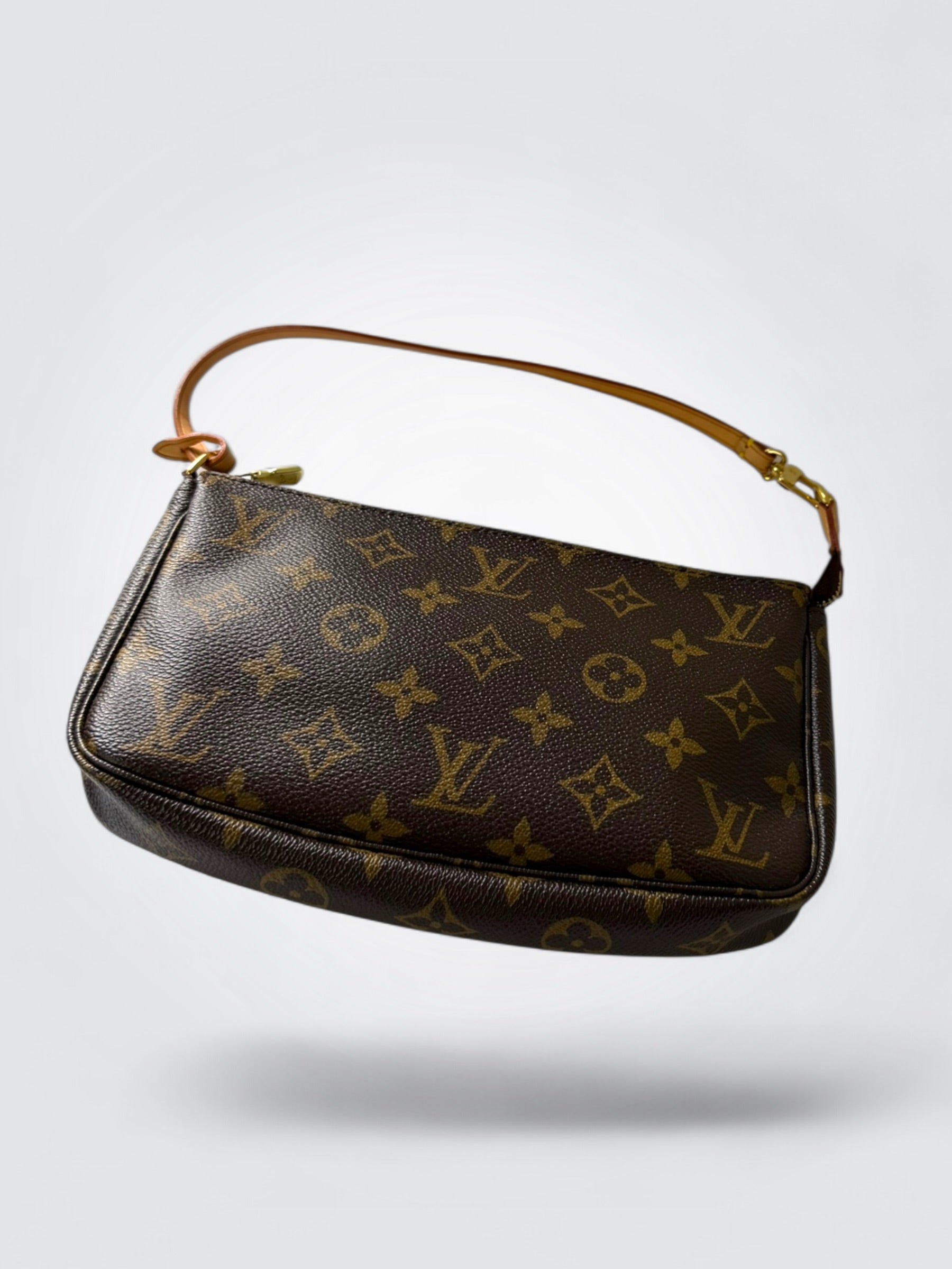 Vintage Louis Vuitton Monogram Pochette Accessoires shoulder bag in brown coated canvas with slim natural leather strap and gold-tone hardware
