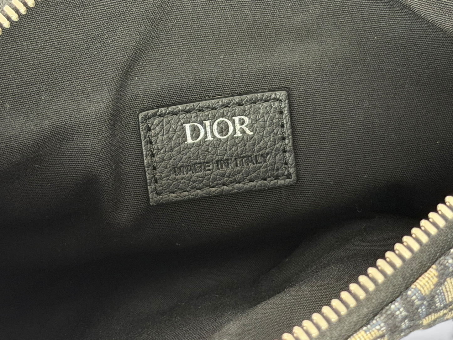 Pre-Owned Christian Dior Men’s Saddle Bag – Cream and Black Dior Oblique Jacquard Canvas with Adjustable Black Strap