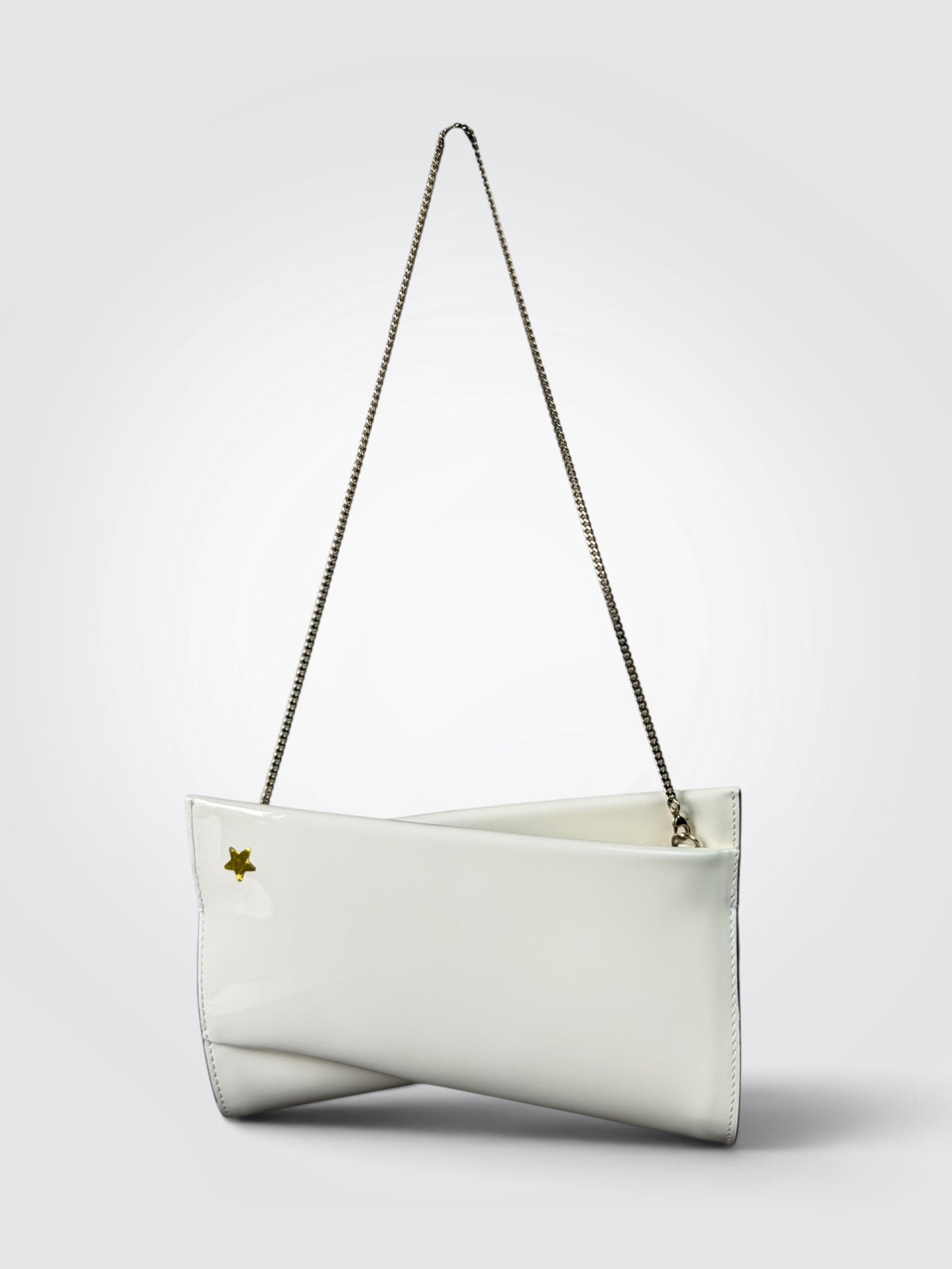 Pre-owned Christian Louboutin Loubitwist small white patent leather and crêpe satin clutch with gold star detail
