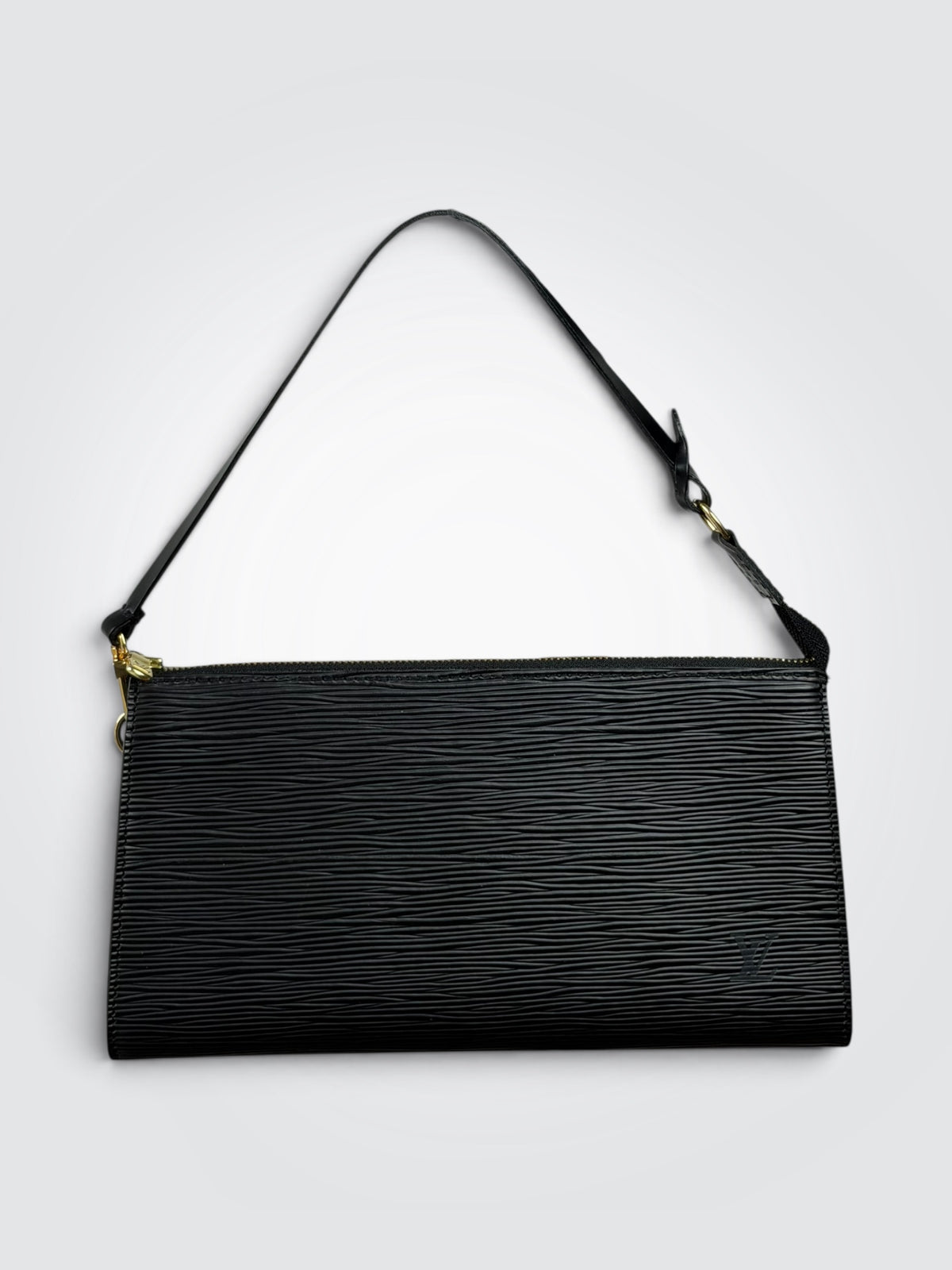 Vintage Louis Vuitton black Epi leather Pochette Accessoires with slim horizontal shape, top zip closure, and short removable shoulder strap