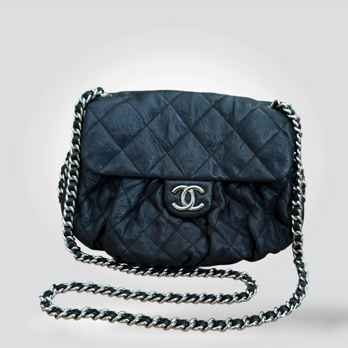 
Pre-Owned Chanel Chain Around black quilted lambskin leather flap bag silver CC hardware wraparound chain strap — Style Reissue Vancouver