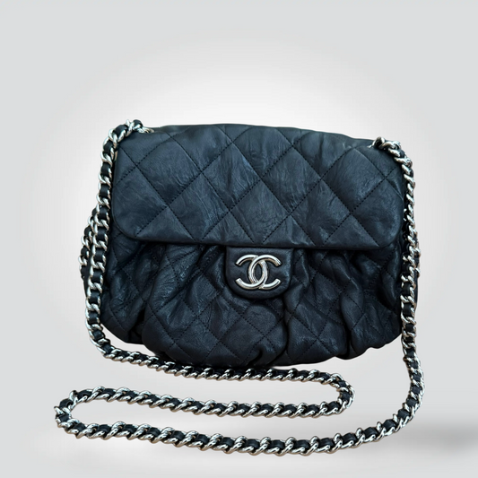 
Pre-Owned Chanel Chain Around black quilted lambskin leather flap bag silver CC hardware wraparound chain strap — Style Reissue Vancouver