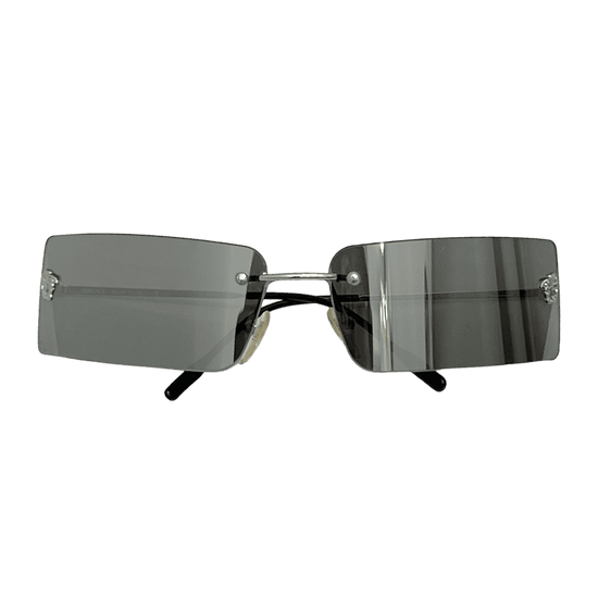 A pair of sleek Versace mirrored rimless sunglasses, featuring a reflective surface and minimalistic frame design, perfect for shielding eyes from the sun while exuding style and sophistication