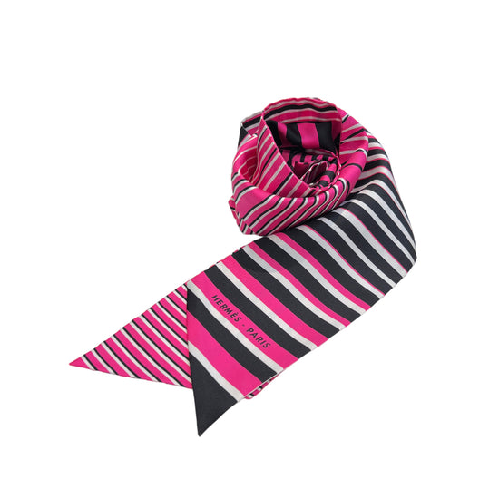 A pink, black, and white striped Hermès Twilly