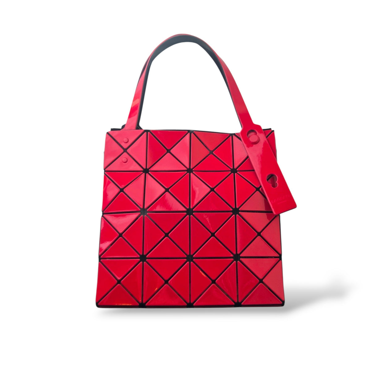 Pre-owned Bao Bao Issey Miyake Lucent tote in red with geometric glossy PVC panels and black adjustable handles — available at Style Reissue Vancouver
