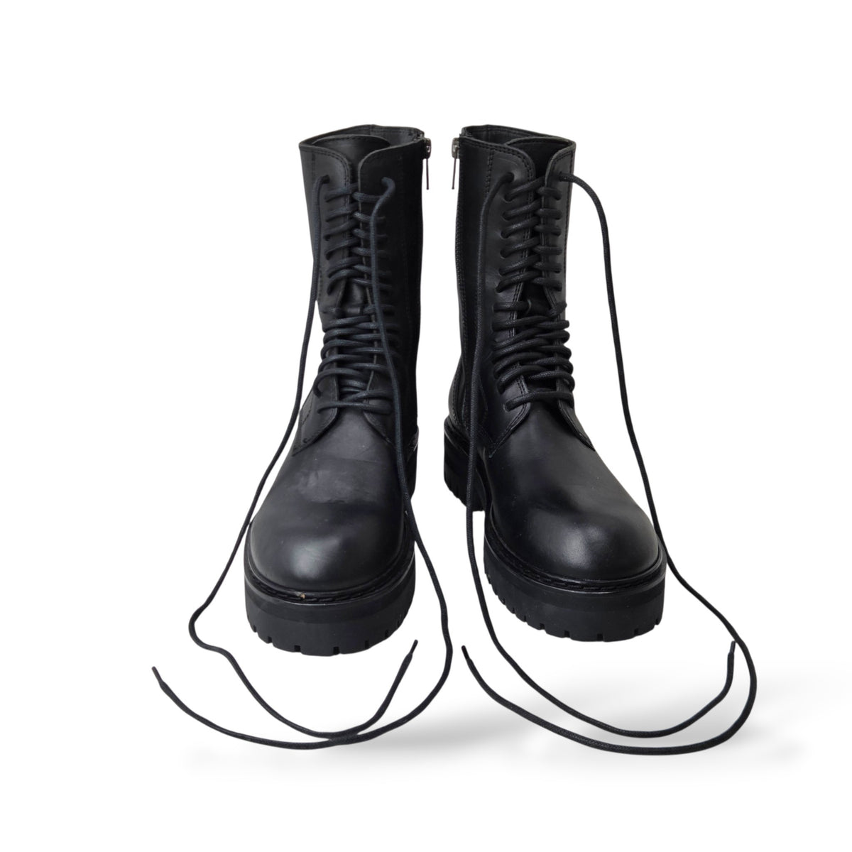 Pre-owned Ann Demeulemeester black leather lace-up combat boots with side zip and chunky rubber sole, size 36.5 — available at Style Reissue Vancouver