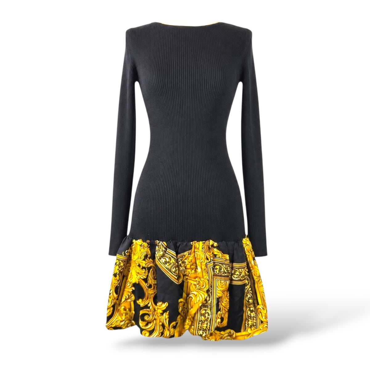 Pre-owned Moschino Couture black ribbed virgin wool knit dress with gold baroque printed silk peplum hem, US 10 — available at Style Reissue Vancouver