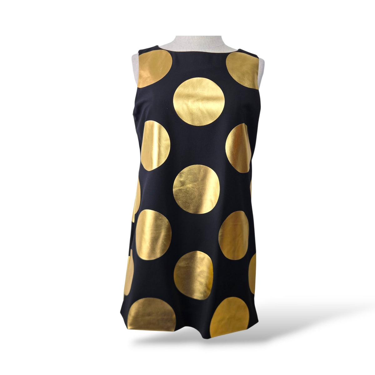 Pre-owned Boutique Moschino black sleeveless shift dress with oversized gold foil polka dot print, size 34 — available at Style Reissue Vancouver