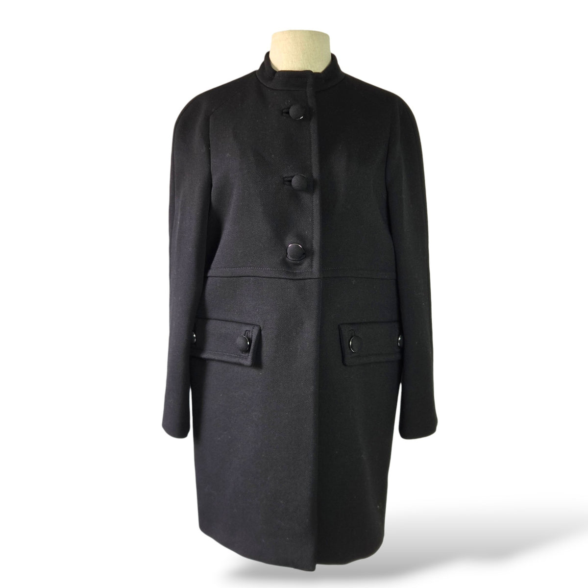 Pre-owned Prada black virgin wool single-breasted coat with mandarin collar, flap pockets and back tab detail, size 44 — available at Style Reissue Vancouver