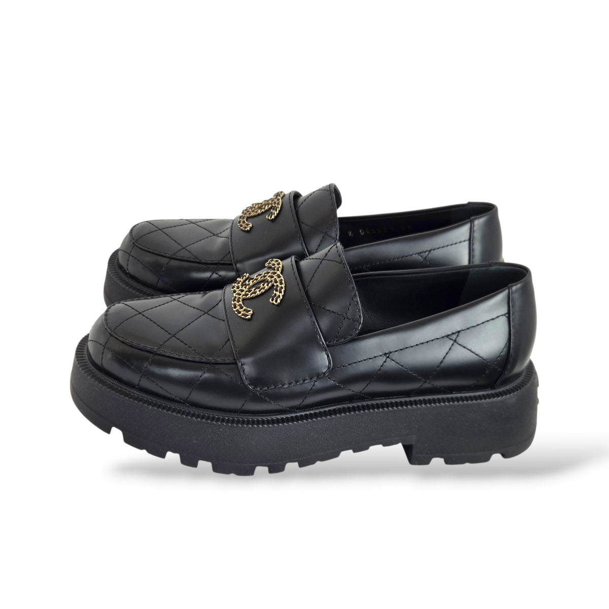 Pre-Owned Chanel Black Quilted Calfskin CC Moccasin Loafers with Gold-Tone Logo
