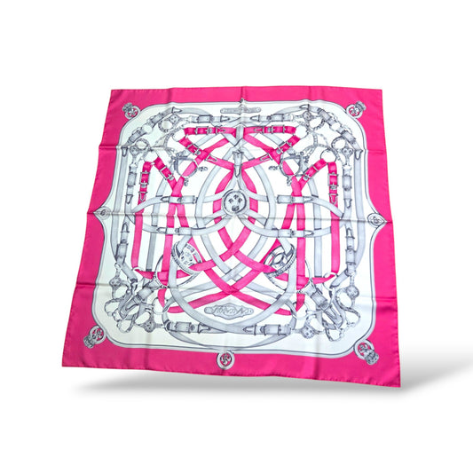 Pre-owned Hermès Cavalcadour Carré 90 hot pink silk scarf with white and grey equestrian strap and buckle motif
