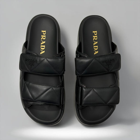 Pre-Owned Prada black nappa leather quilted padded double strap slide sandals embossed logo size 37.5 made in Italy — Style Reissue Vancouver