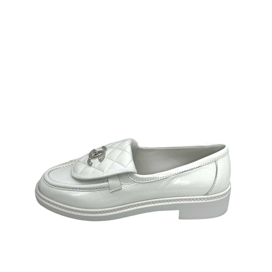 chanel CC white quilted loafers left outer side view