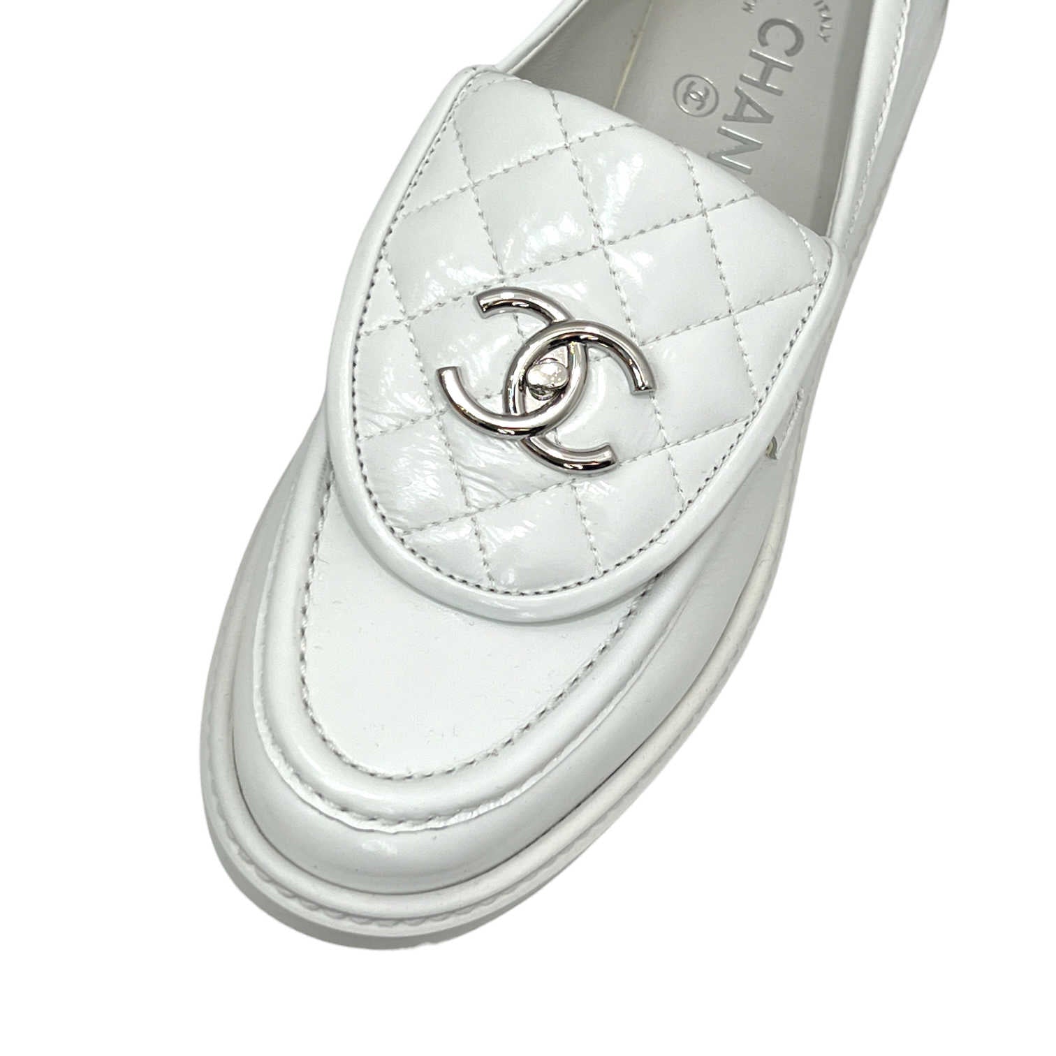 chanel CC white quilted loafers hardware detail zoom